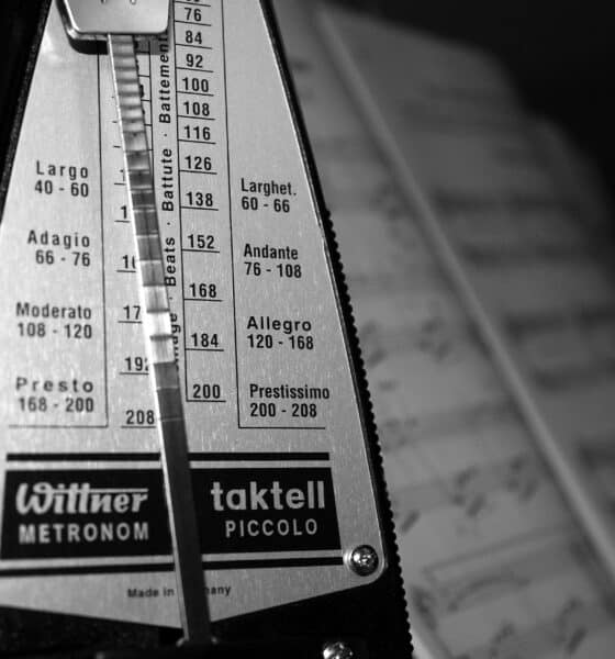 black and white picture of a mechanic metronome with Largo, Larghetto, Moderato, Allegro and Presto on it